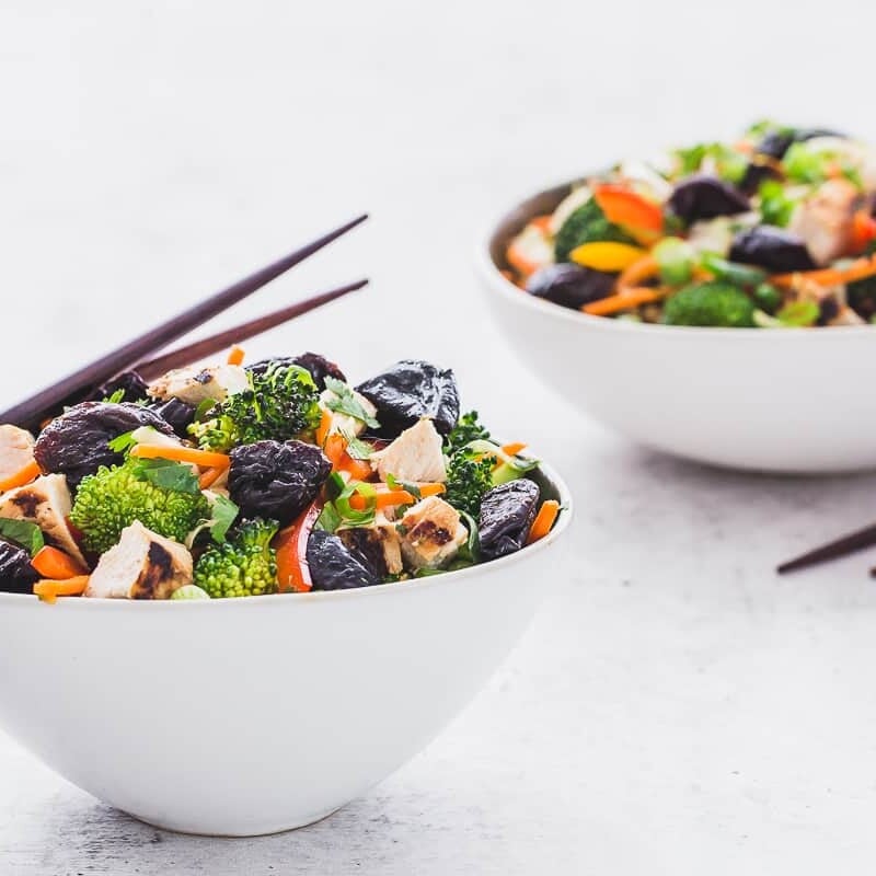 two bowls of Zesty Asian Chicken Salad with chopsticks