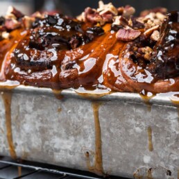 a tin full of Incredible Pecan Sticky Buns
