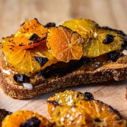 slice of toast with broiled citrus and prunes