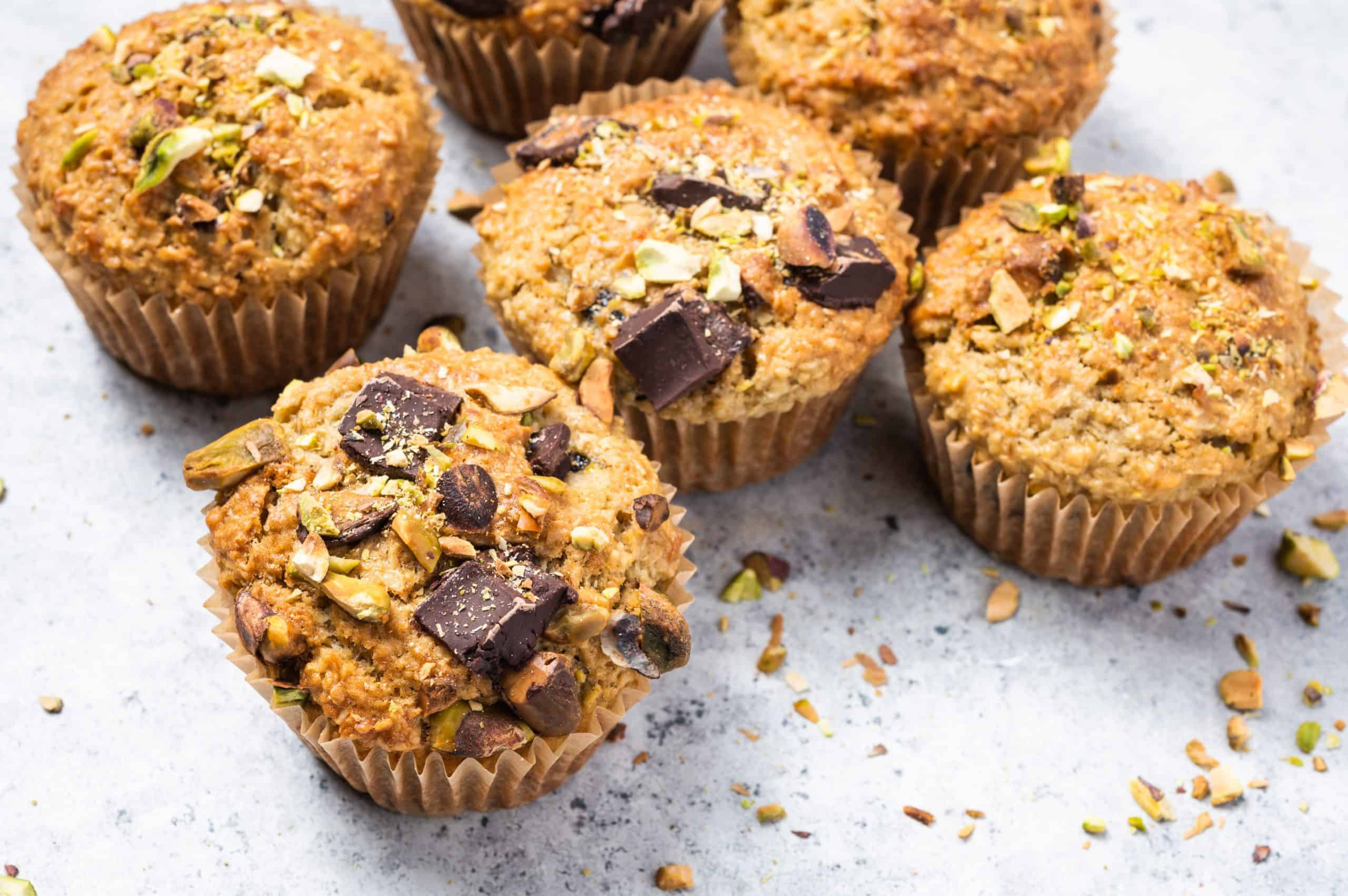 dark chocolate and nut studded morning muffins on a kitchen counter