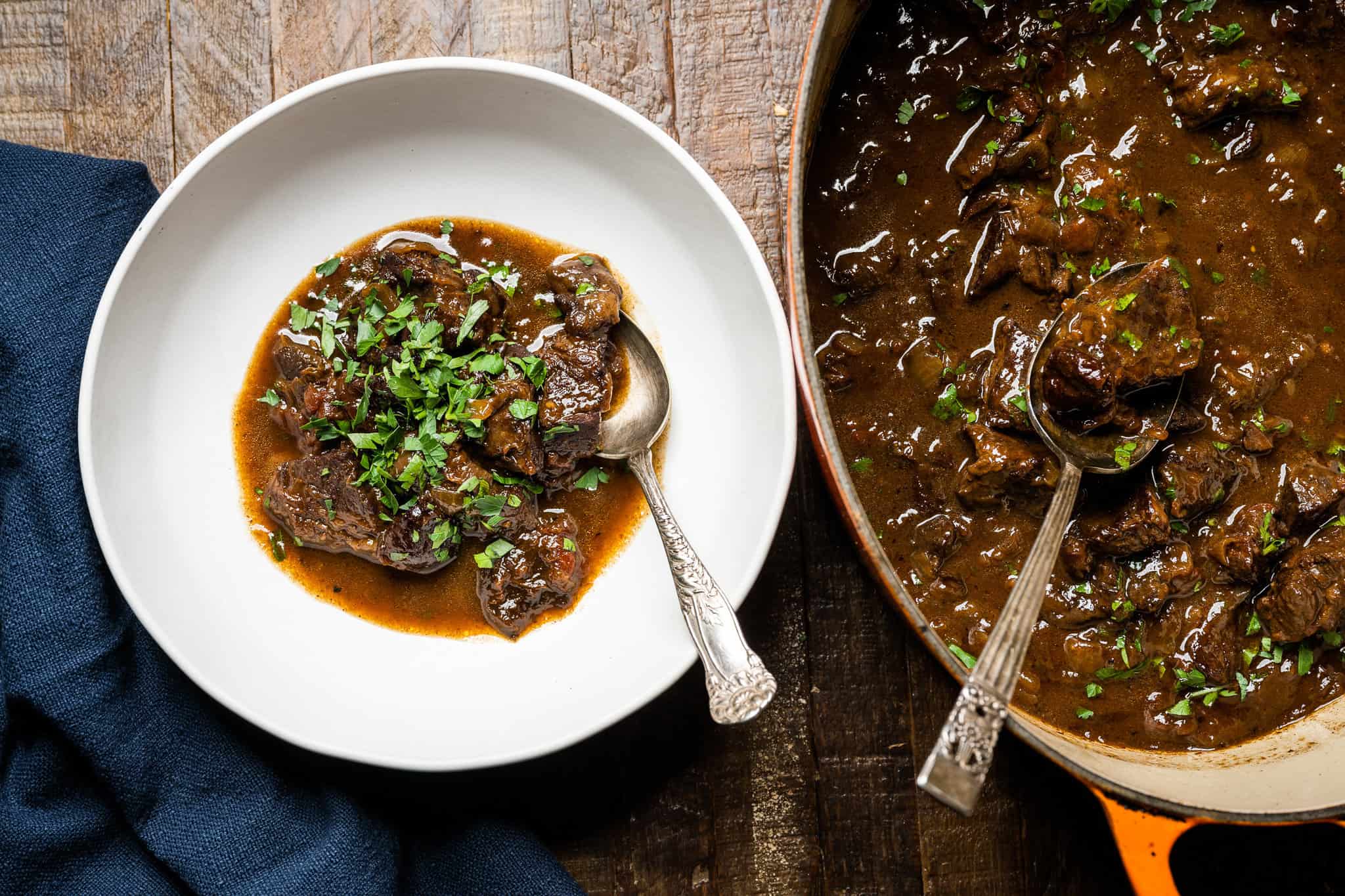 a bowl of Beef Stew with Red Wine and Prunes by Chef Stephanie Cmar