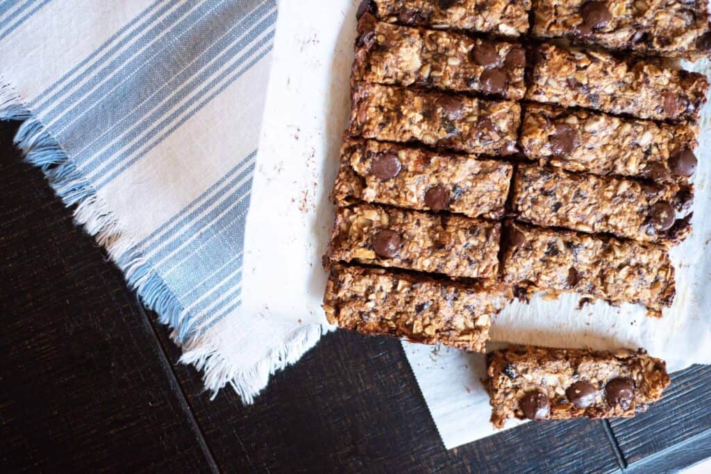 sliced California Prune Energy Bars on a striped towel