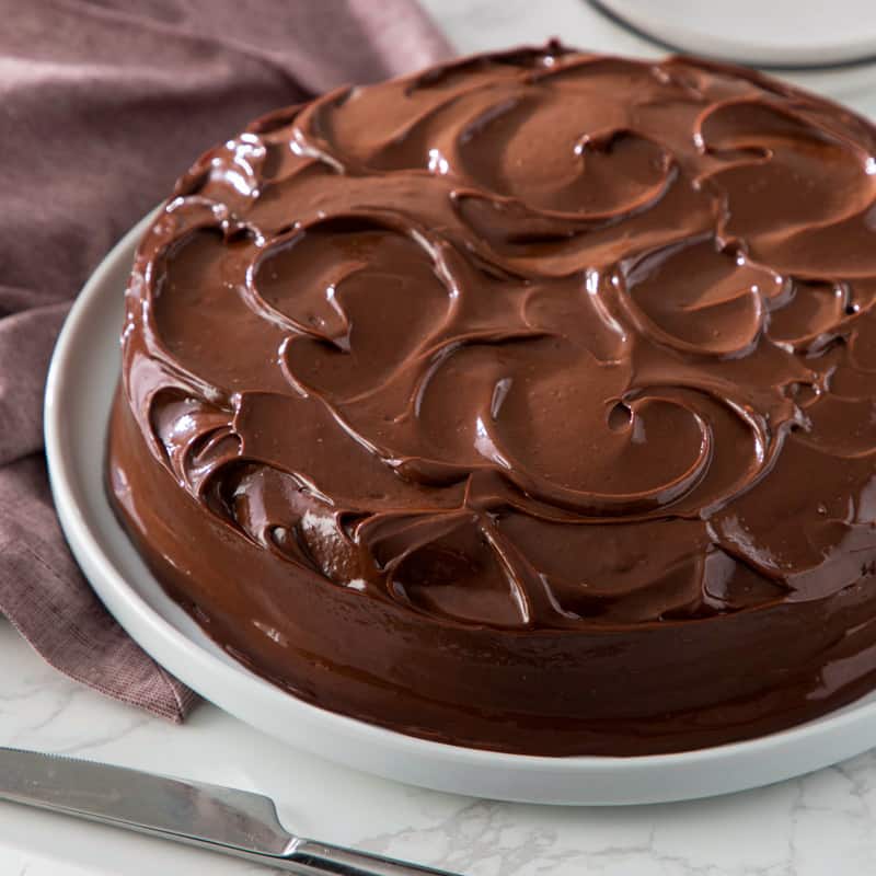 Chocolate Prune Olive Oil Cake from Bake from Scratch on a white cake plate