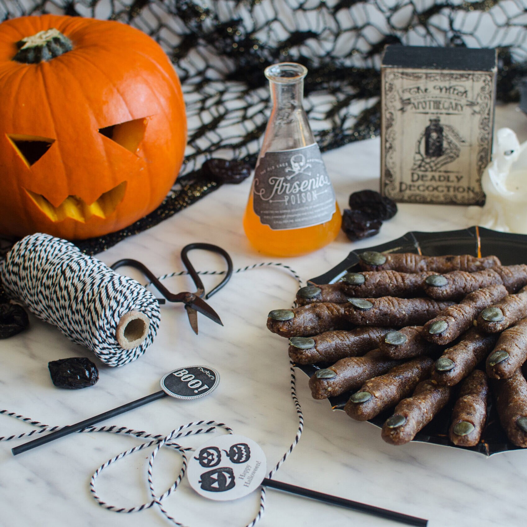 Healthy Halloween Treats: a black plate of Raw Witches Fingers