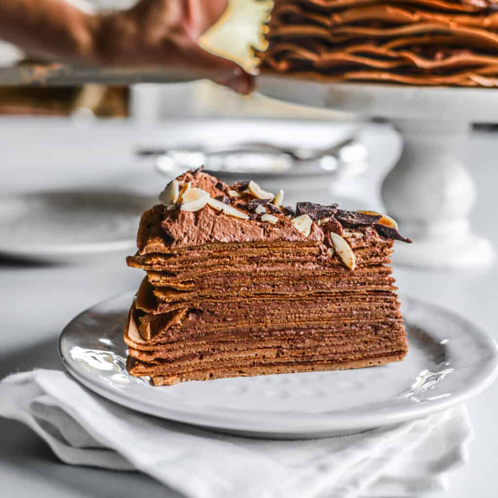 a slice of chocolate crepe cake
