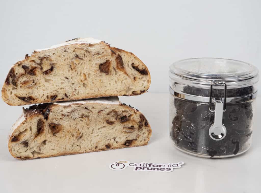 two halves of a loaf of Sourdough Bread with California Prunes