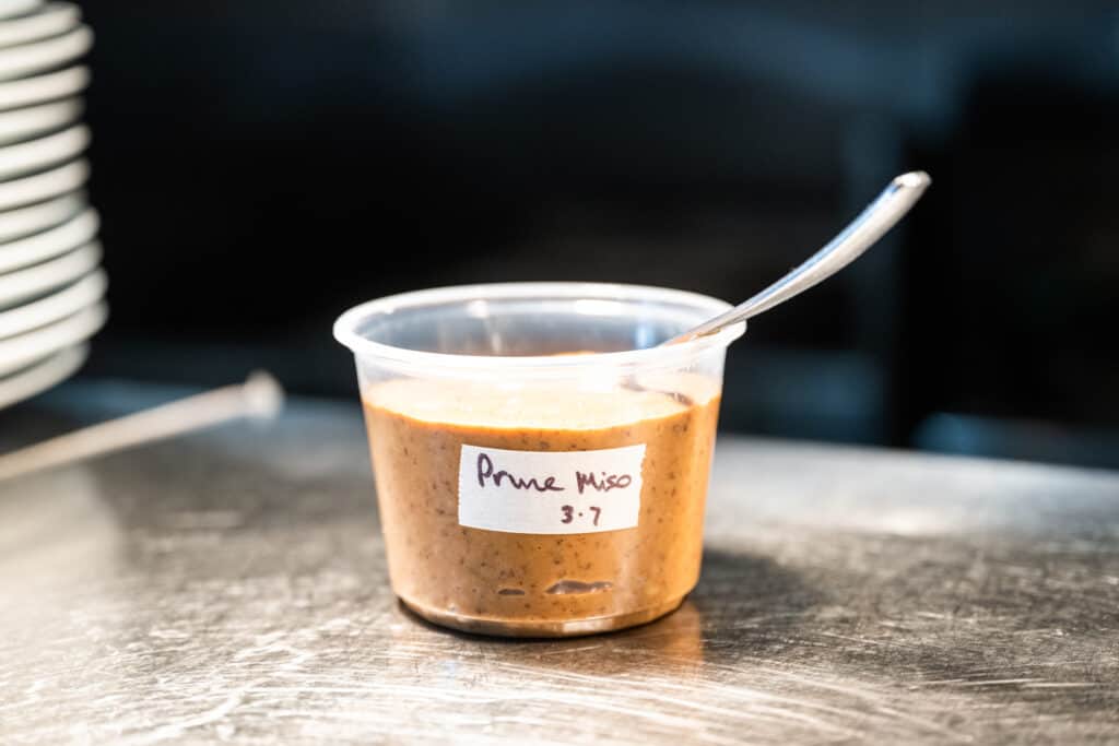 a tub of Prune Miso Dip from Hawks Public House
