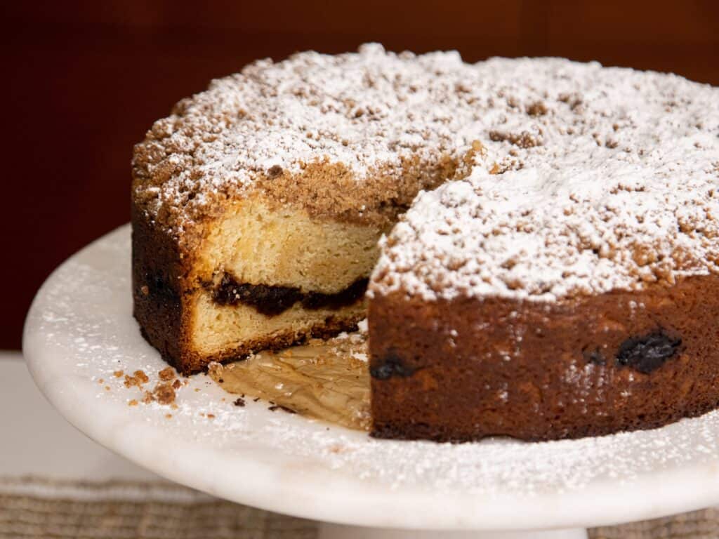 a Shabbat Coffee cake with a slice taken out