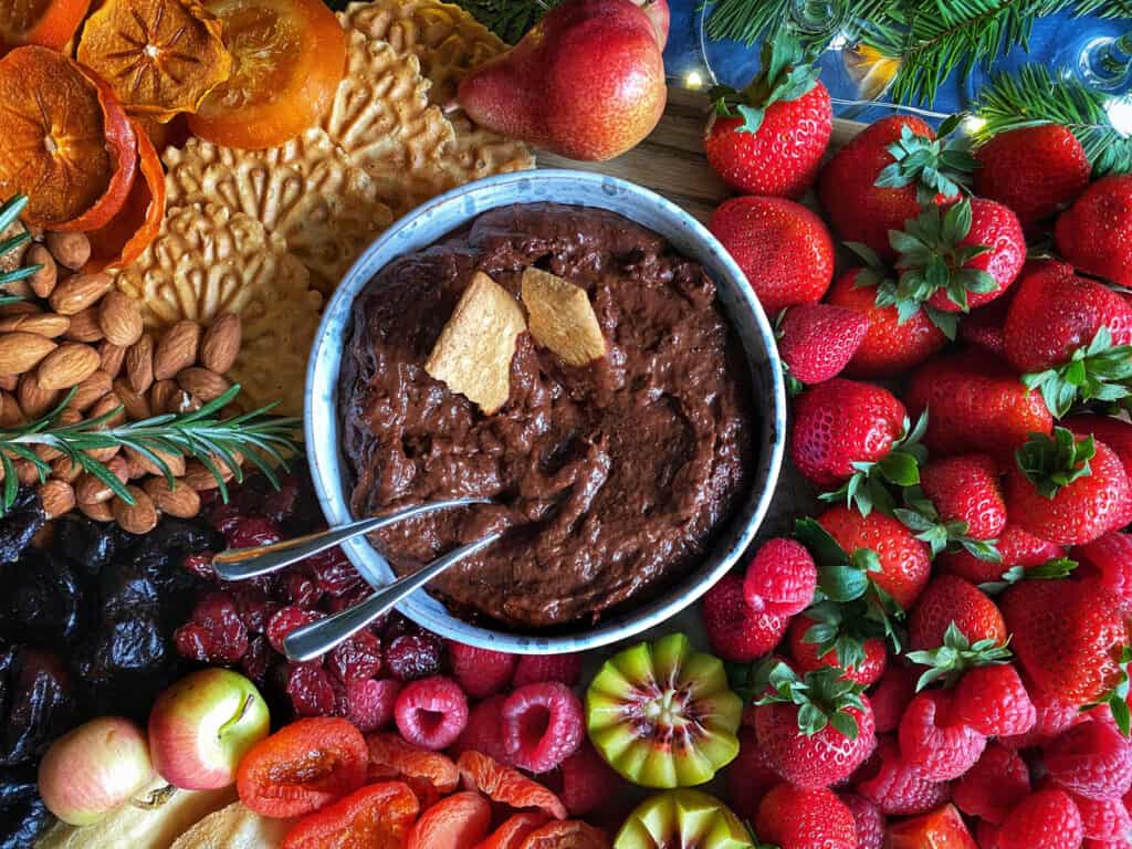 A fruity graze board with a bowl of  Chocolate Spread | Nutella from the Delicious Life