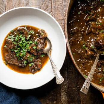 a bowl and a serving dish with Stephanie Cmar's Beef Stew with Red Wine