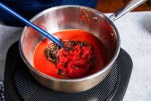 stirring ingredients together for an easy BBQ sauce recipe