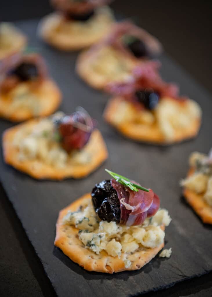 easy blue cheese appetizer with prosciutto wrapped prunes 