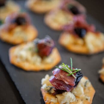 blue cheese appetizer with prunes and prosciutto