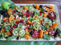 beautiful winter fruit salad arranged on a platter