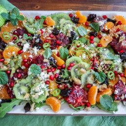 beautiful winter fruit salad arranged on a platter