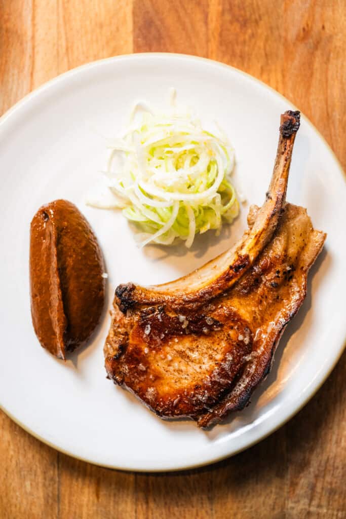 ana castro's pork chop with miso plated