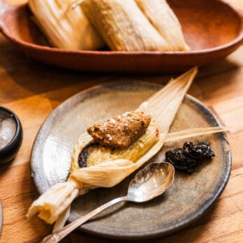 Ana Castro's Sweet Corn Tamales with Prunes and Pecans on a plate