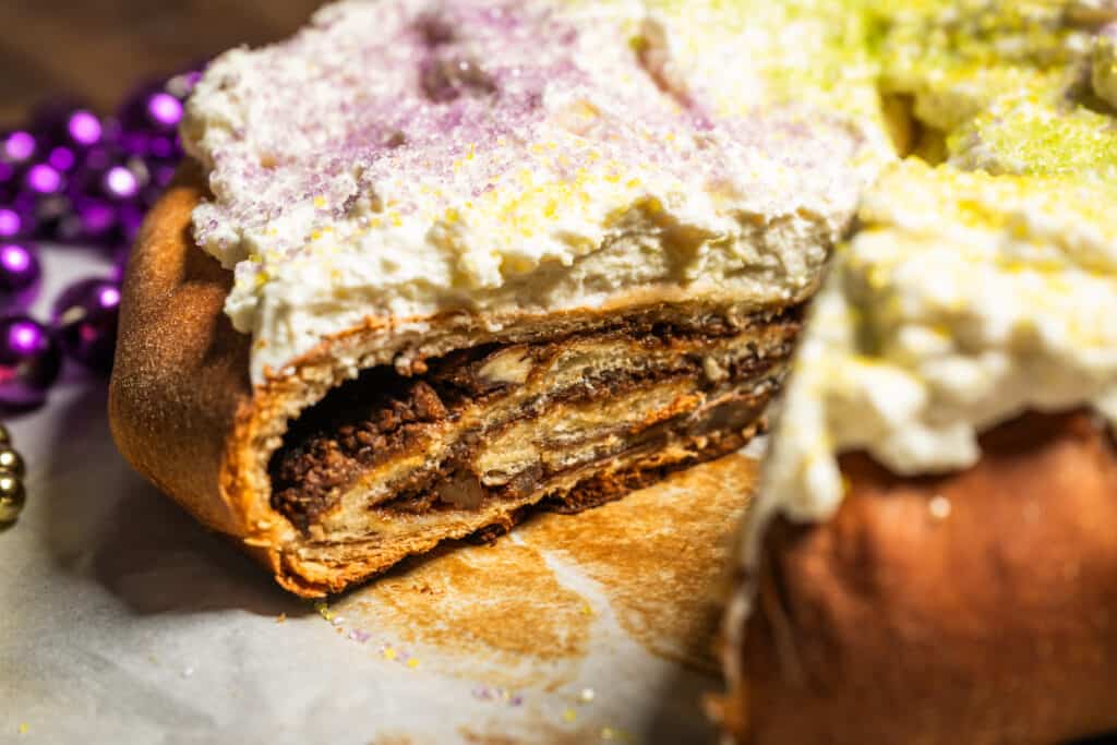 sliced king cake with cinnamon filling