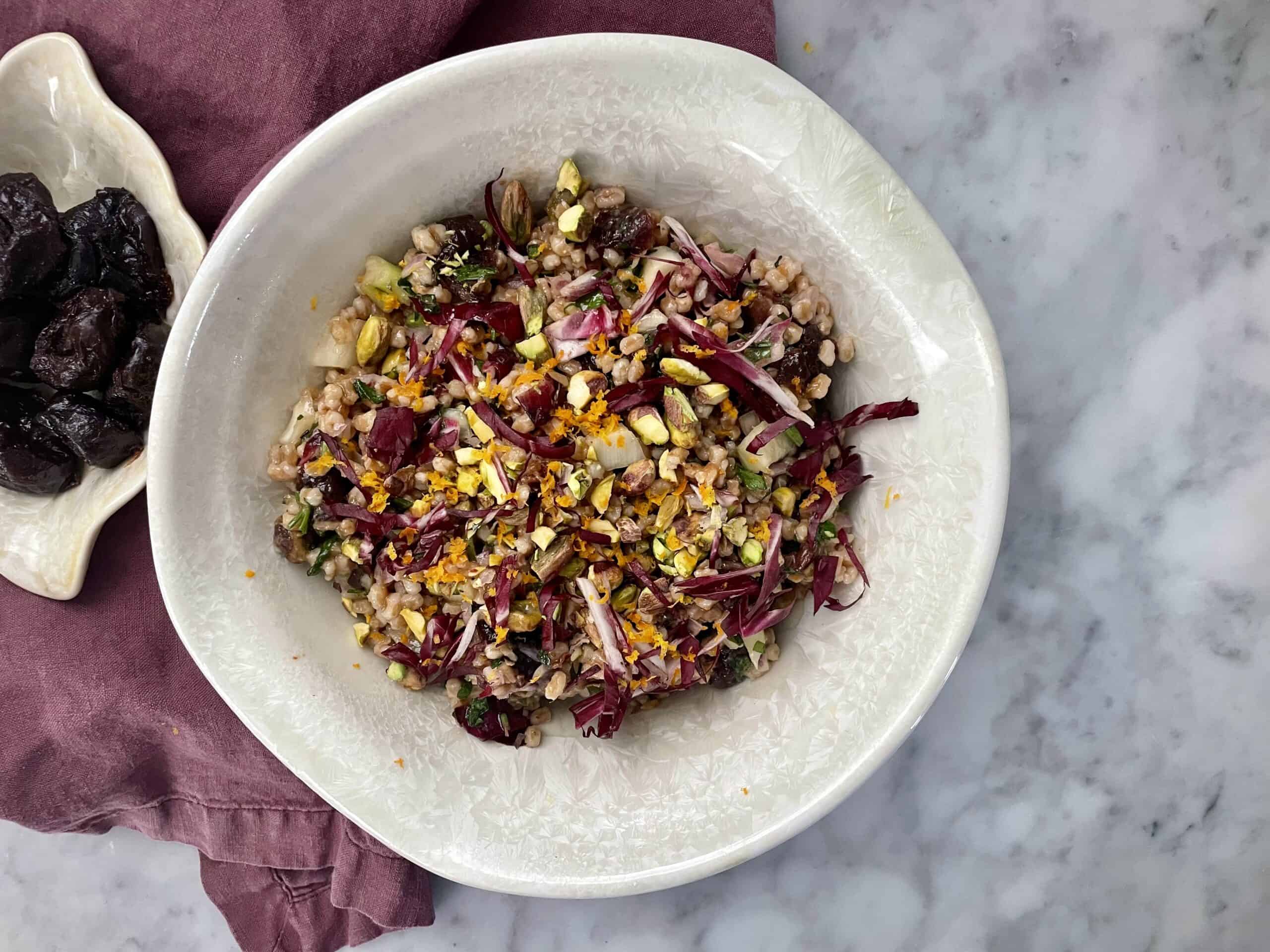 Bowl of Prune and Farro Salad Recipe with Zesty Herb Vinaigrette