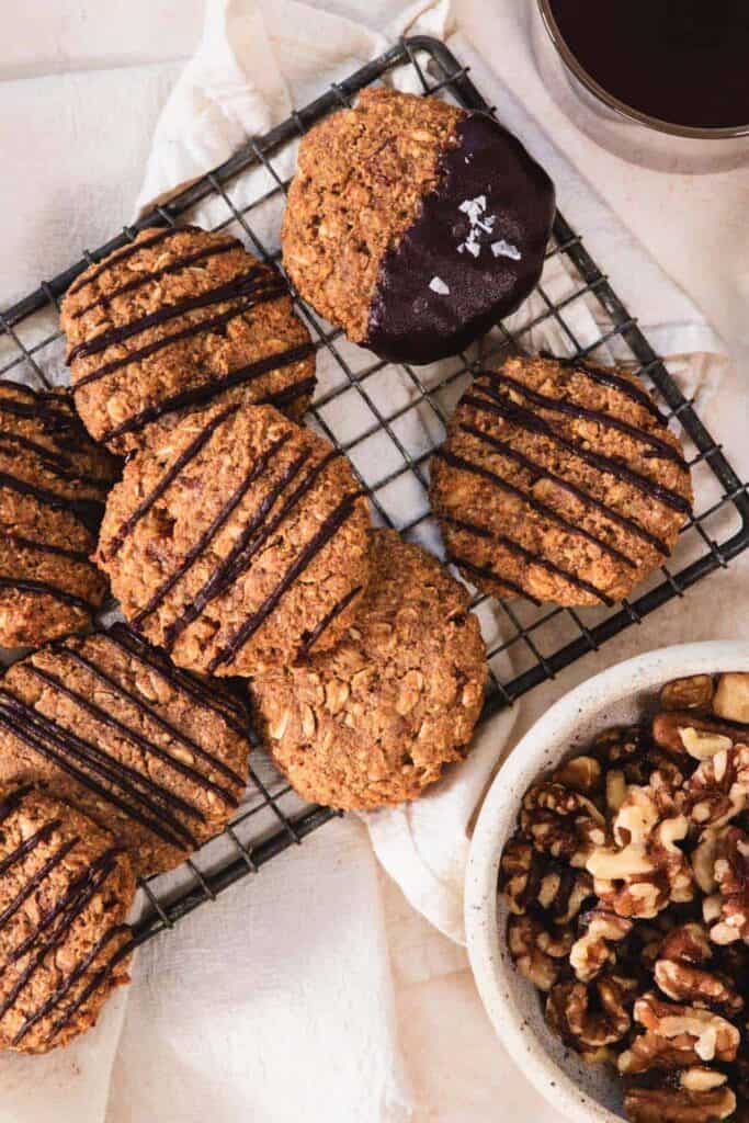 breakfast cookies drizzled with chocolate on a cooling rack