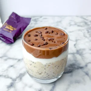 overnight oats with protein powder topped with a rich chocolate mousse