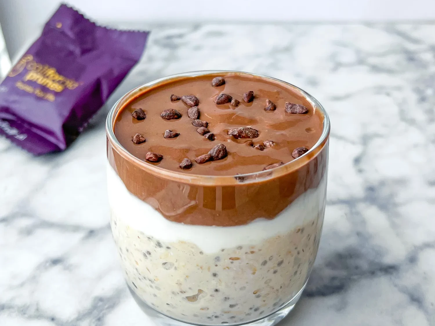 overnight oats with protein powder topped with a rich chocolate mousse