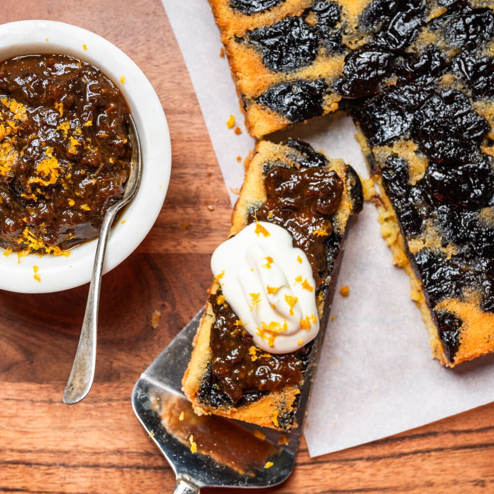 slice of prune cake with whipped cream