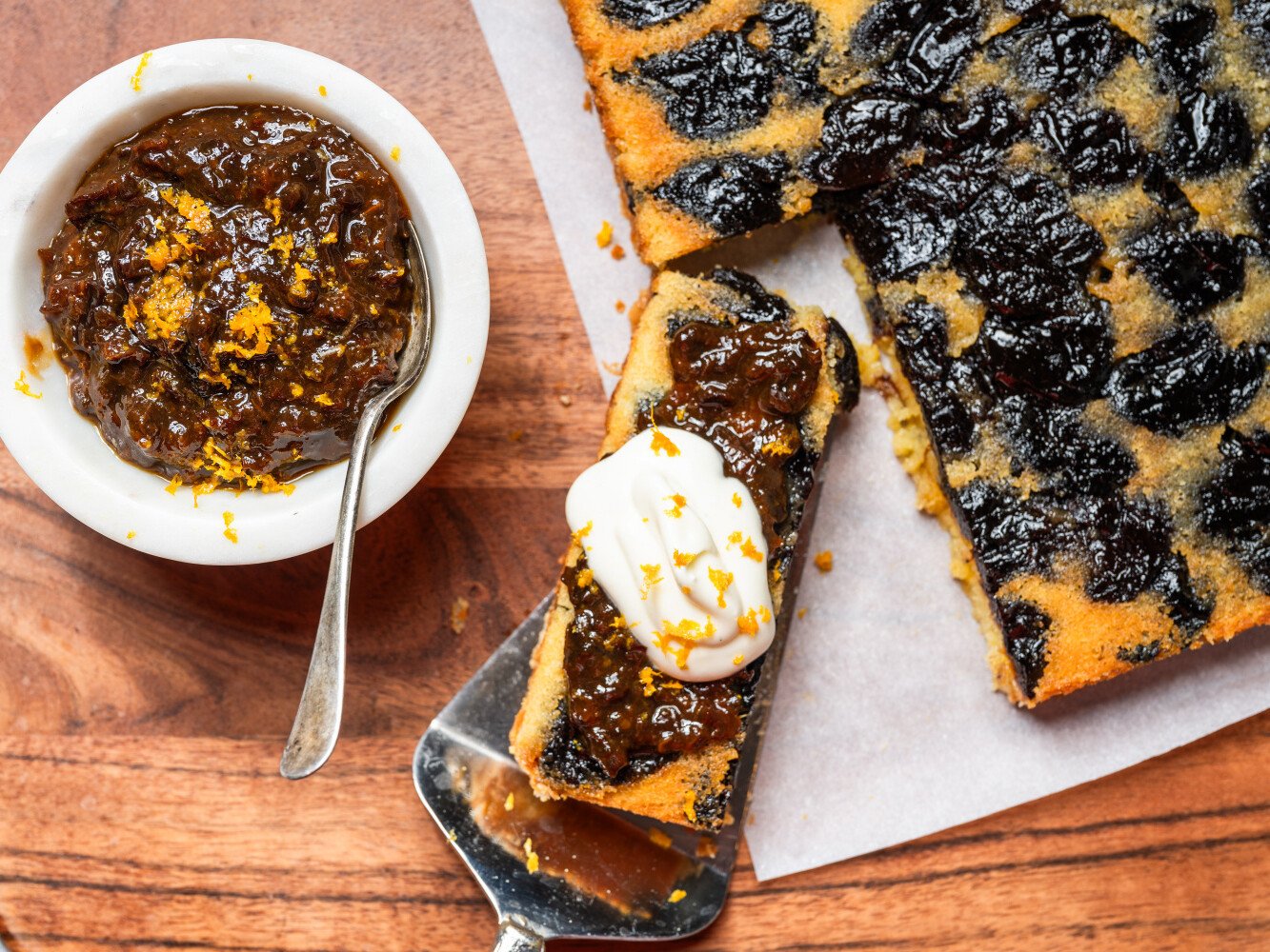 slice of prune cake with whipped cream