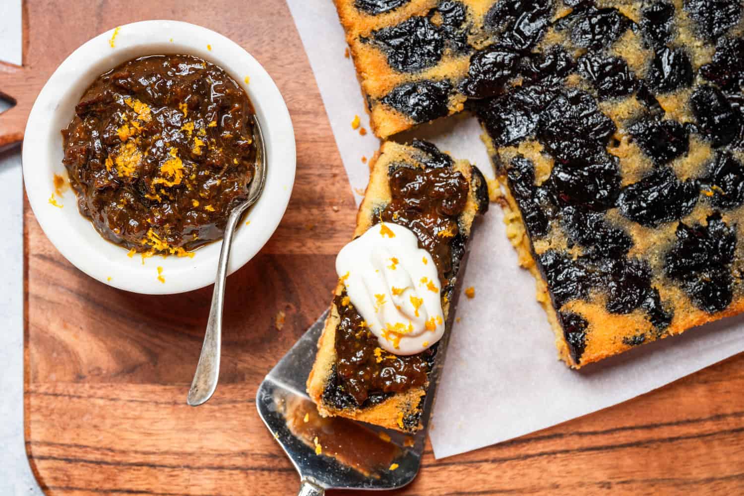 slice of prune cake with whipped cream