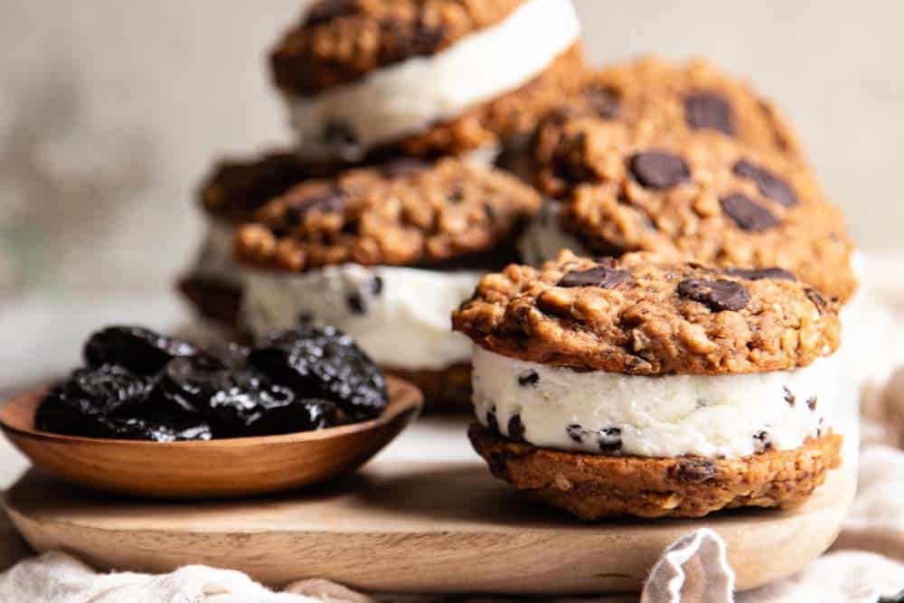 Six ice cream sandwich cookies on a serving board.