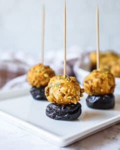 cheeseball stuffed prunes with toothpicks