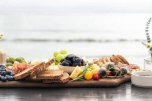cheese board | charcuterie featuring California Prunes at the beach in California
