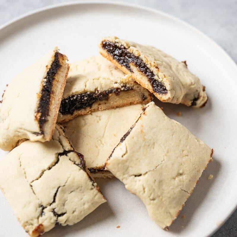 prune newtons on a white plate