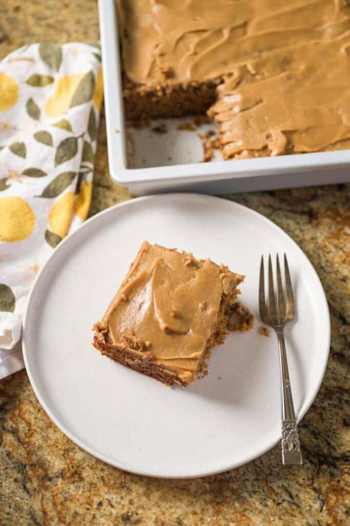 prune spice cake on a white plate