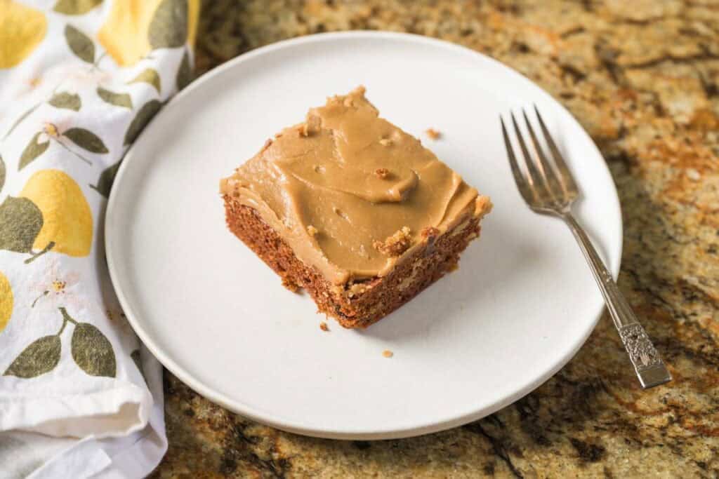 prune spice cake on a white plate
