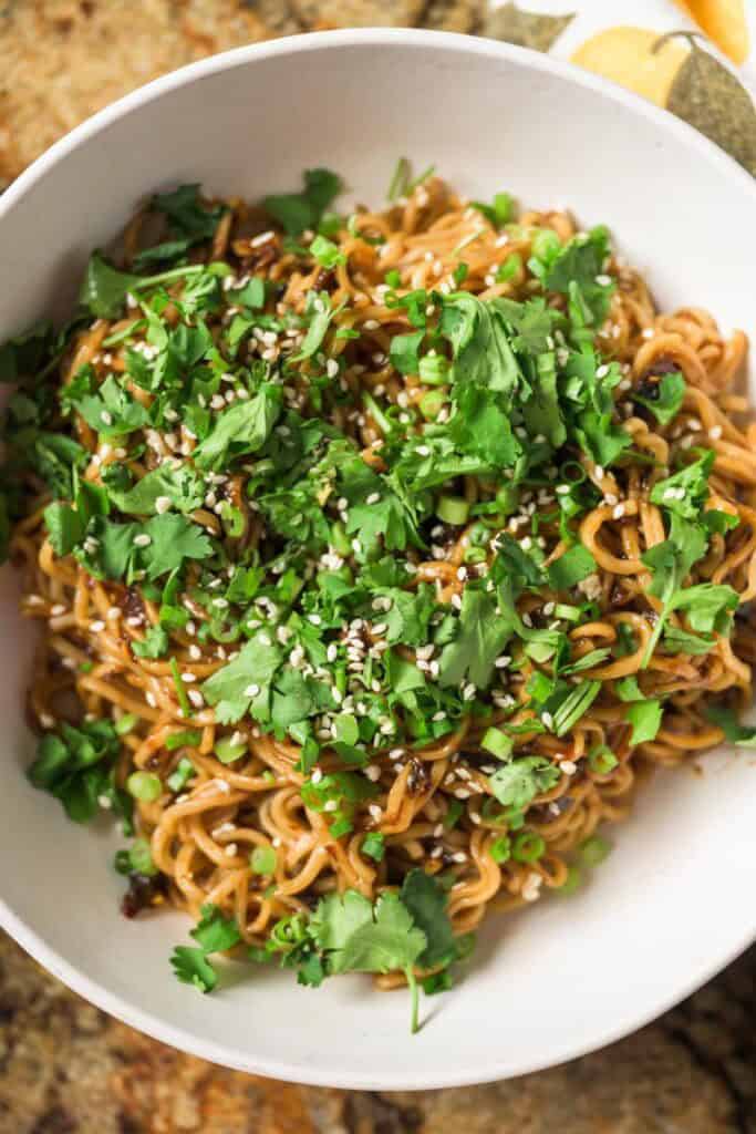 soy sauce ramen noodles in a white bowl