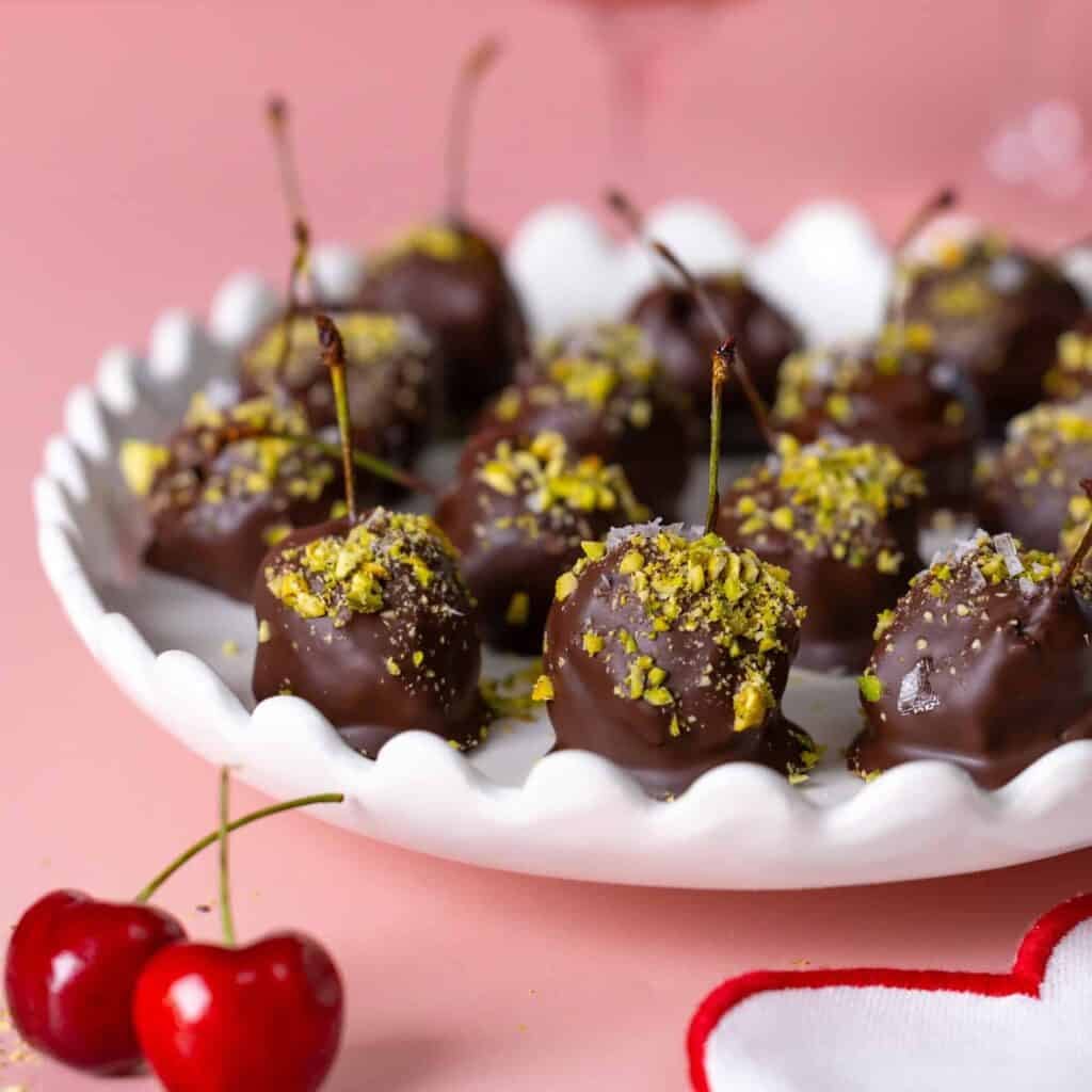 chocolate cherry bombs on a white platter
