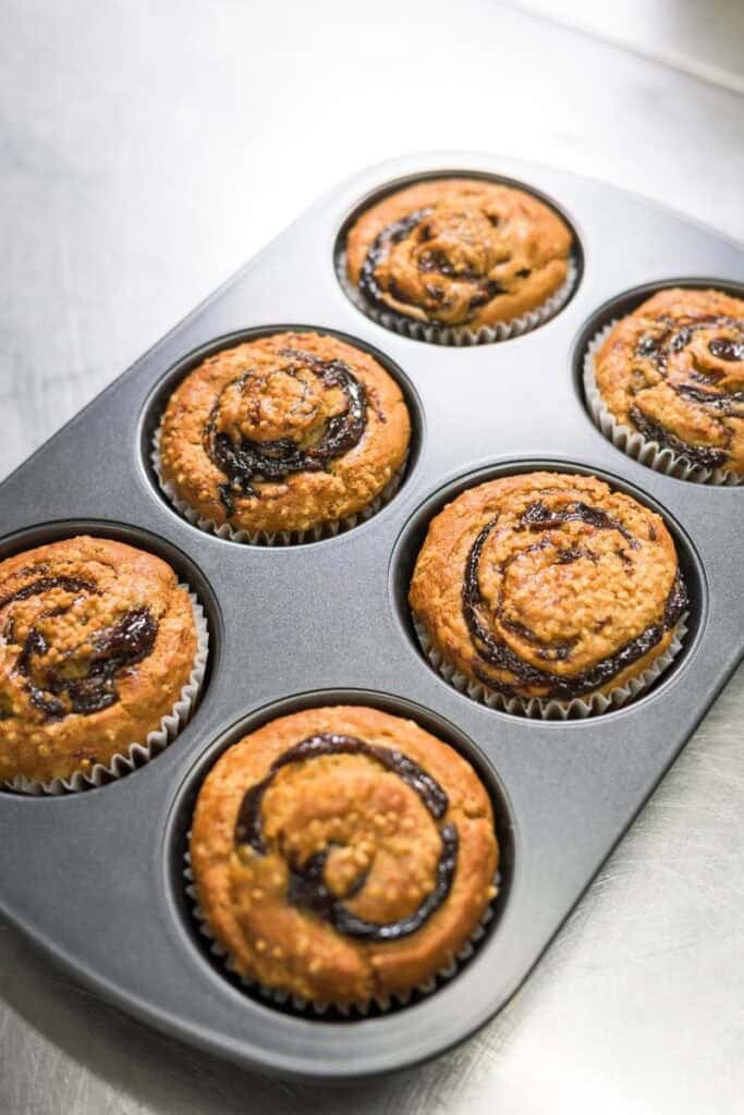 banana prune muffins in a pan