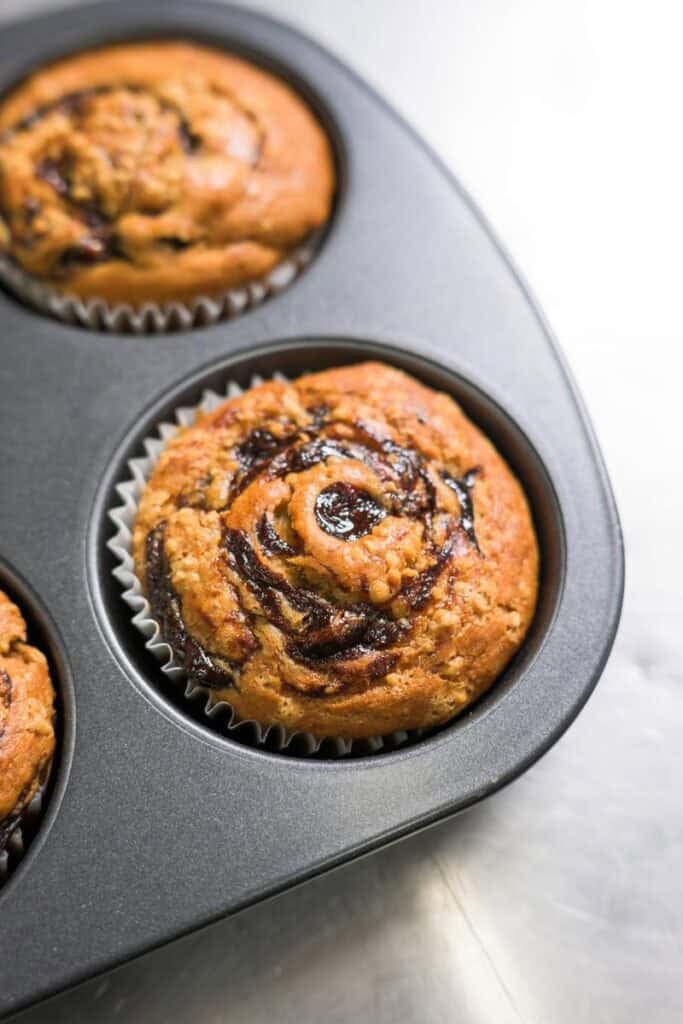banana prune muffins in a pan