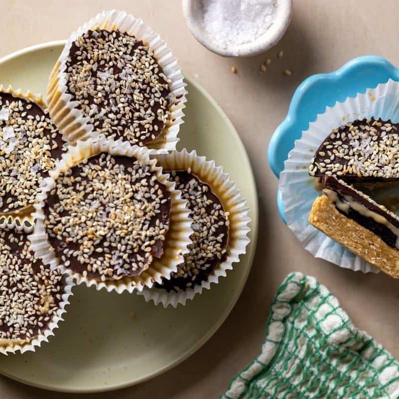 chocolate tahini prune oat cups on a white plate