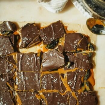 dulce de leche chocolate bars sliced on parchment paper