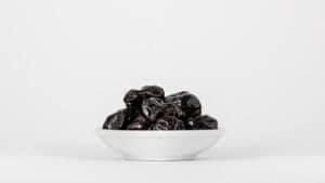 prunes in a white bowl